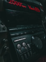 Marantz receiver with a digital display showing volume and input settings.