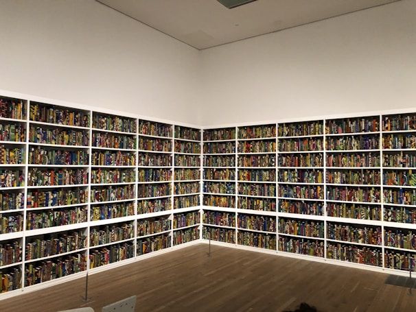 Photo of Inkwell Press team packaging books in a bright, organized warehouse.