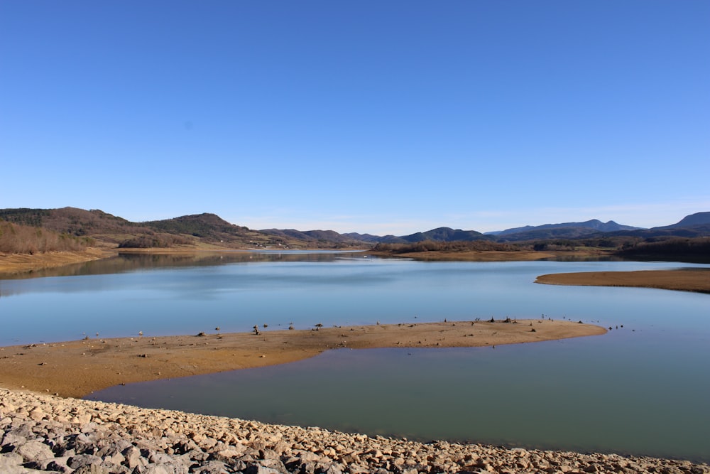 a large body of water surrounded by mountains