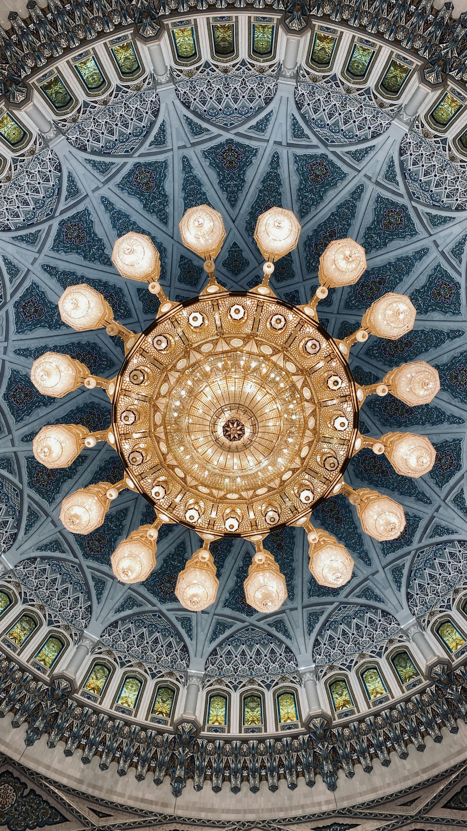 a chandelier hanging from the ceiling of a building