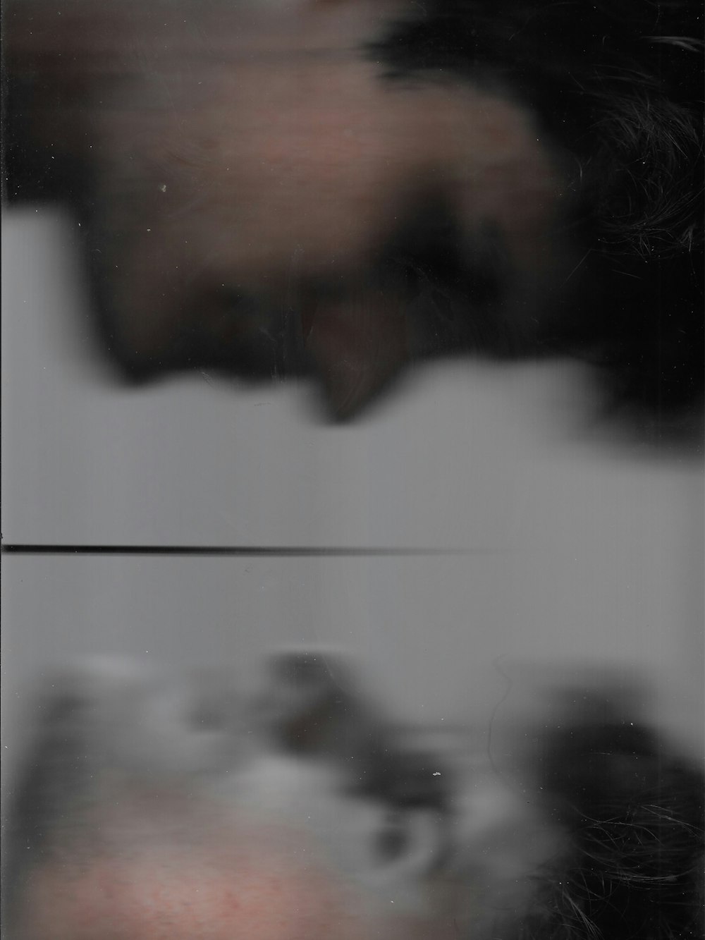 a blurry photo of a person's face