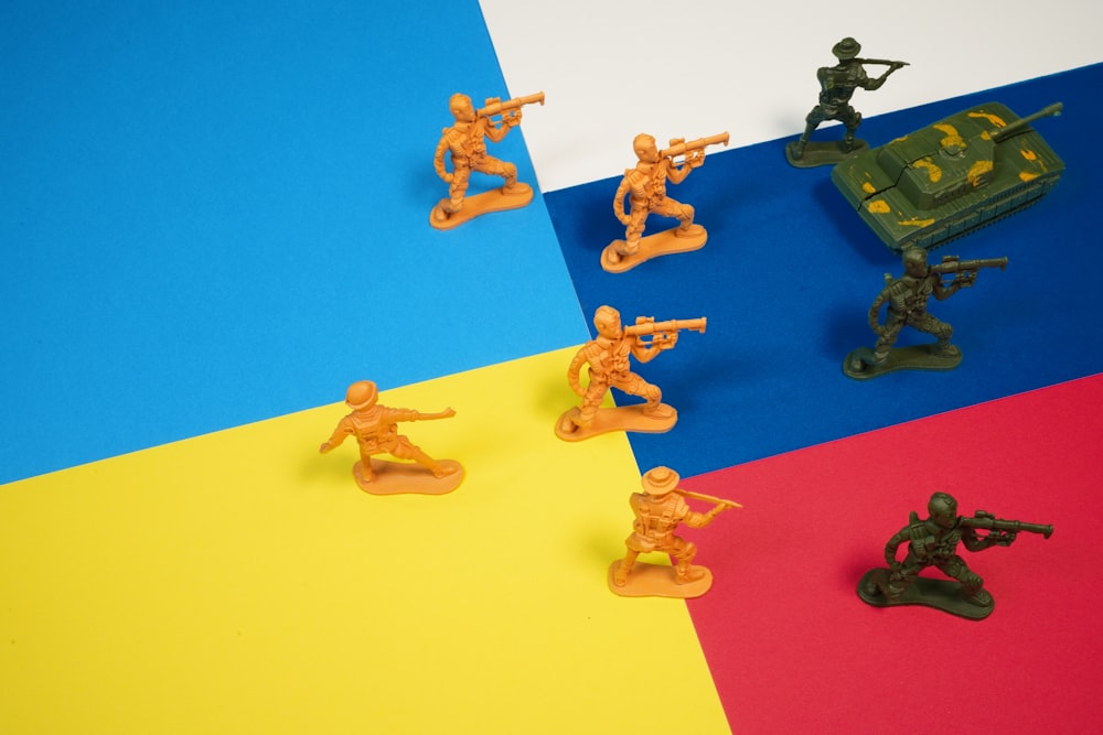 a group of toy soldiers standing next to each other