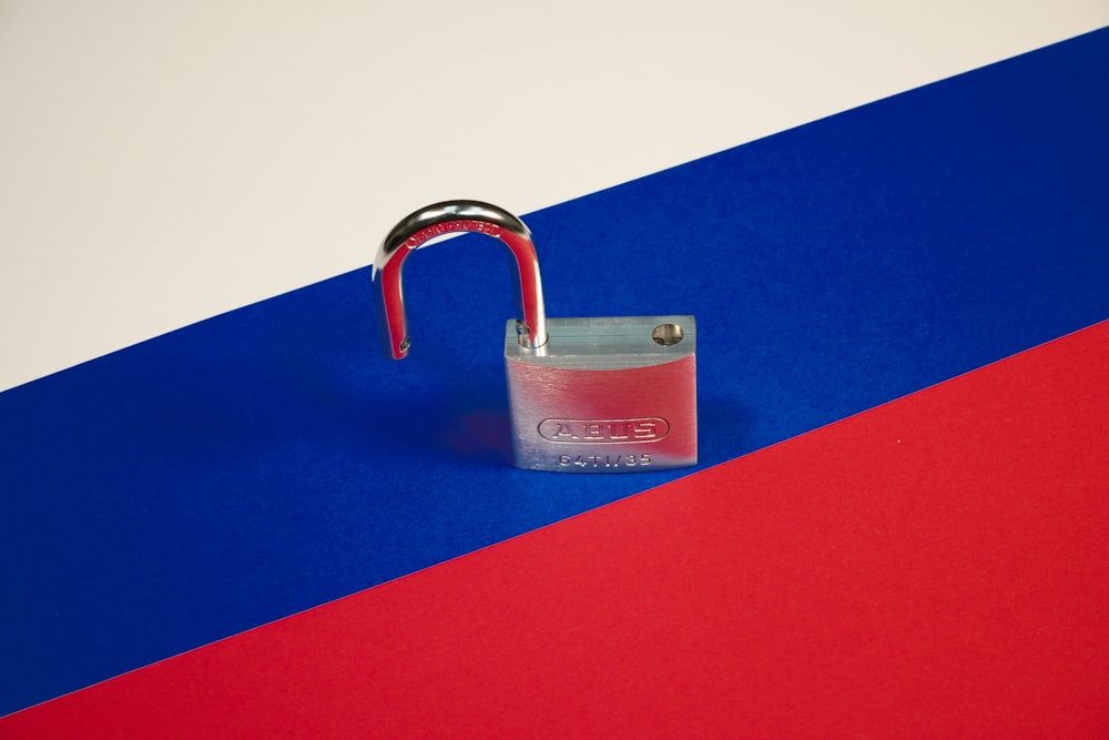 a padlock on a red, white, and blue background