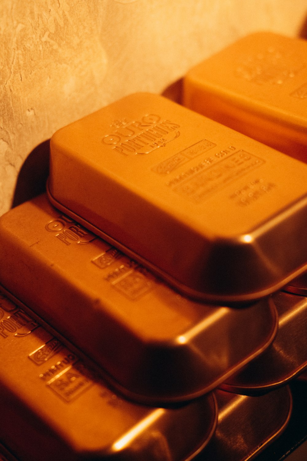 a stack of gold bars sitting on top of a counter