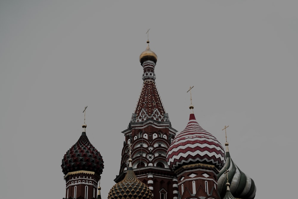 a very tall building with a clock on it's side