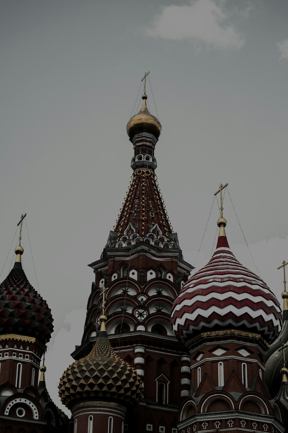 a very tall building with a clock on it's side