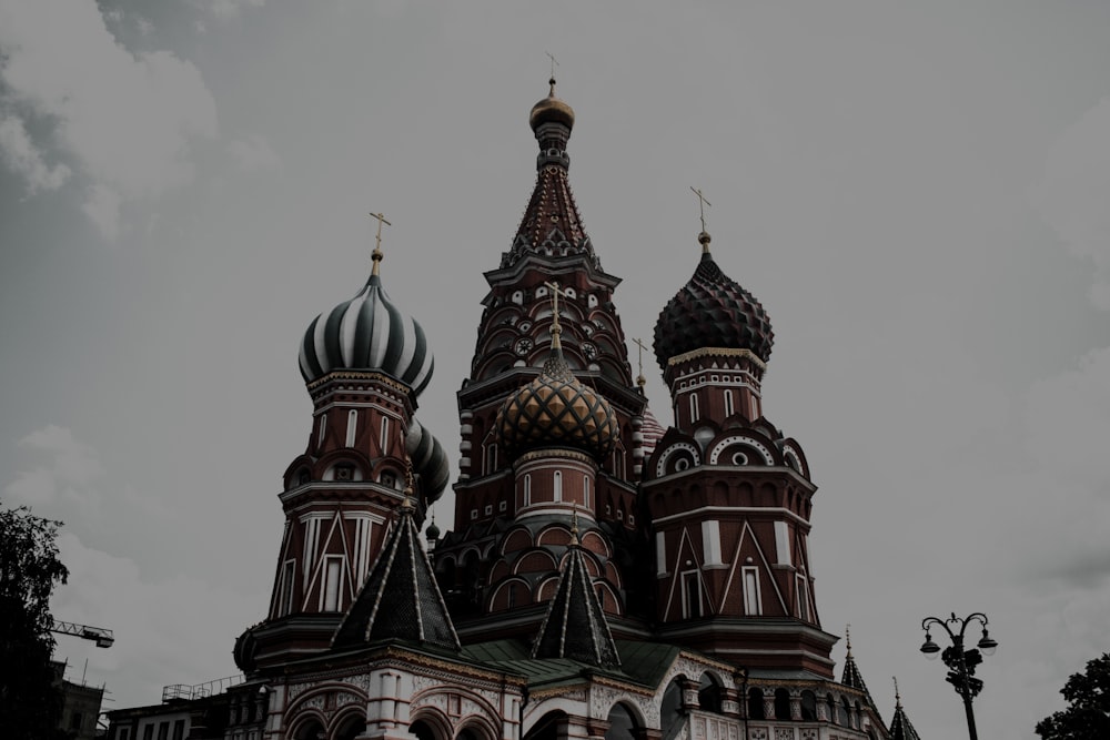 a very tall building with a clock on it's side