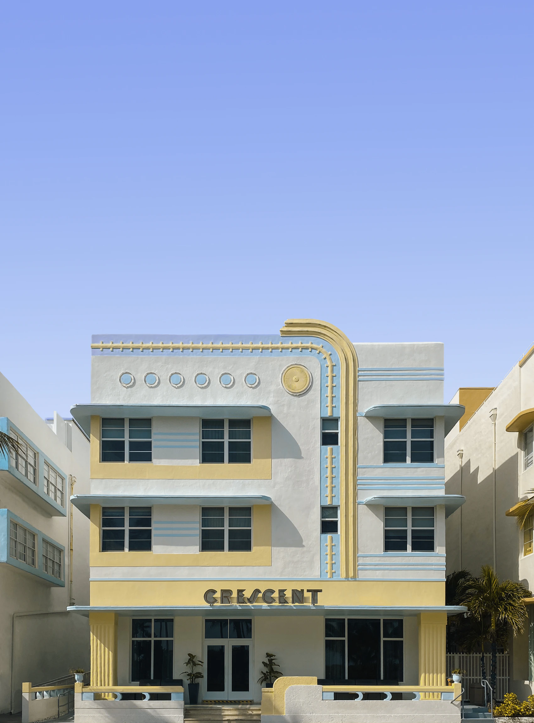 Pastel Art Deco architecture beneath blue sky in South Beach, Miami