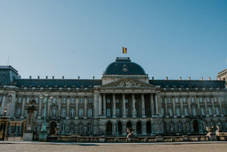a large building with a flag on top of it