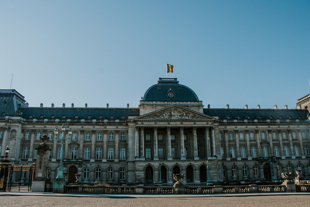 a large building with a flag on top of it