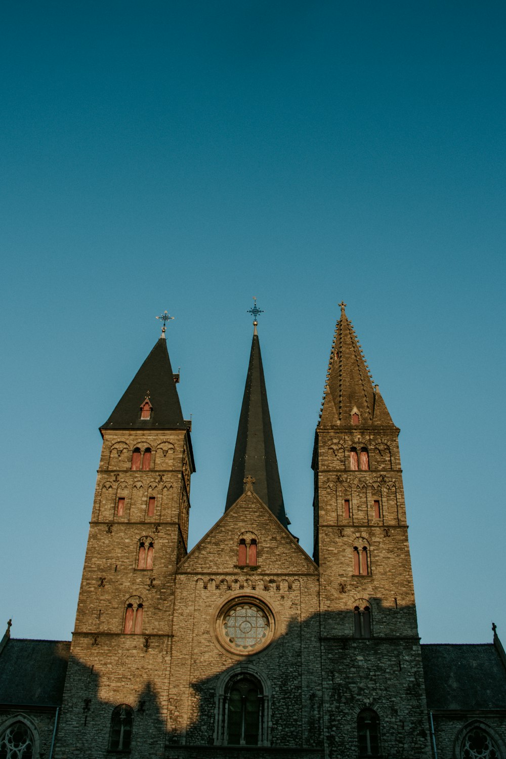 a large church with two towers and a clock