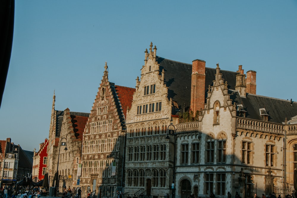 a group of buildings with a sky background