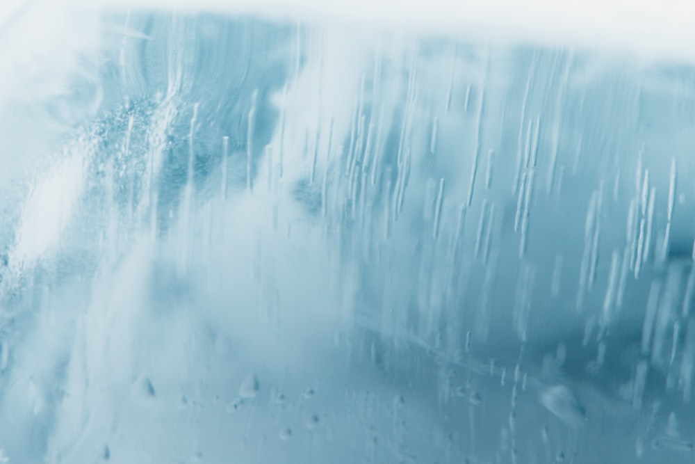 a close up of ice on a window pane