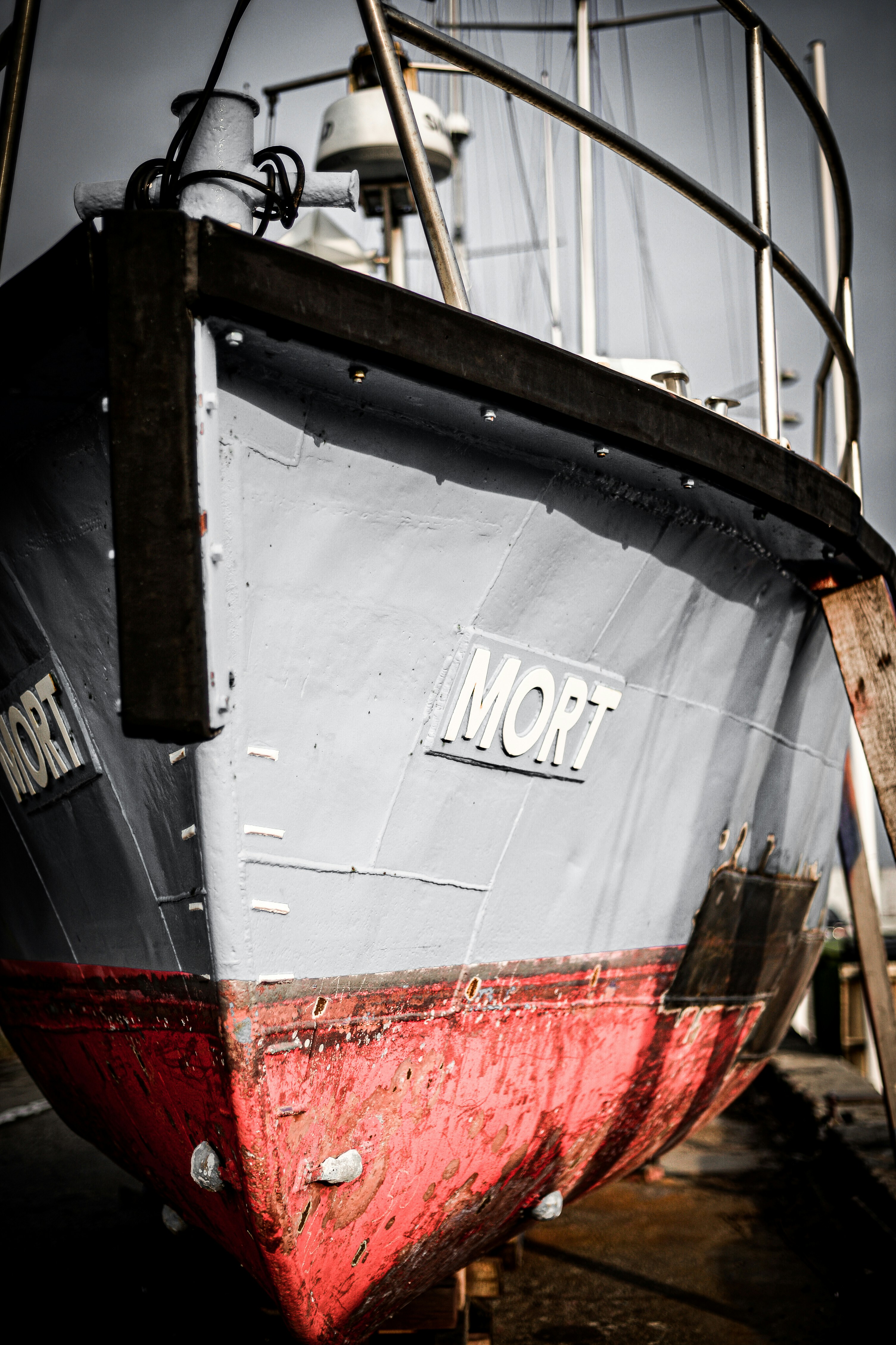 a boat that is sitting on the ground