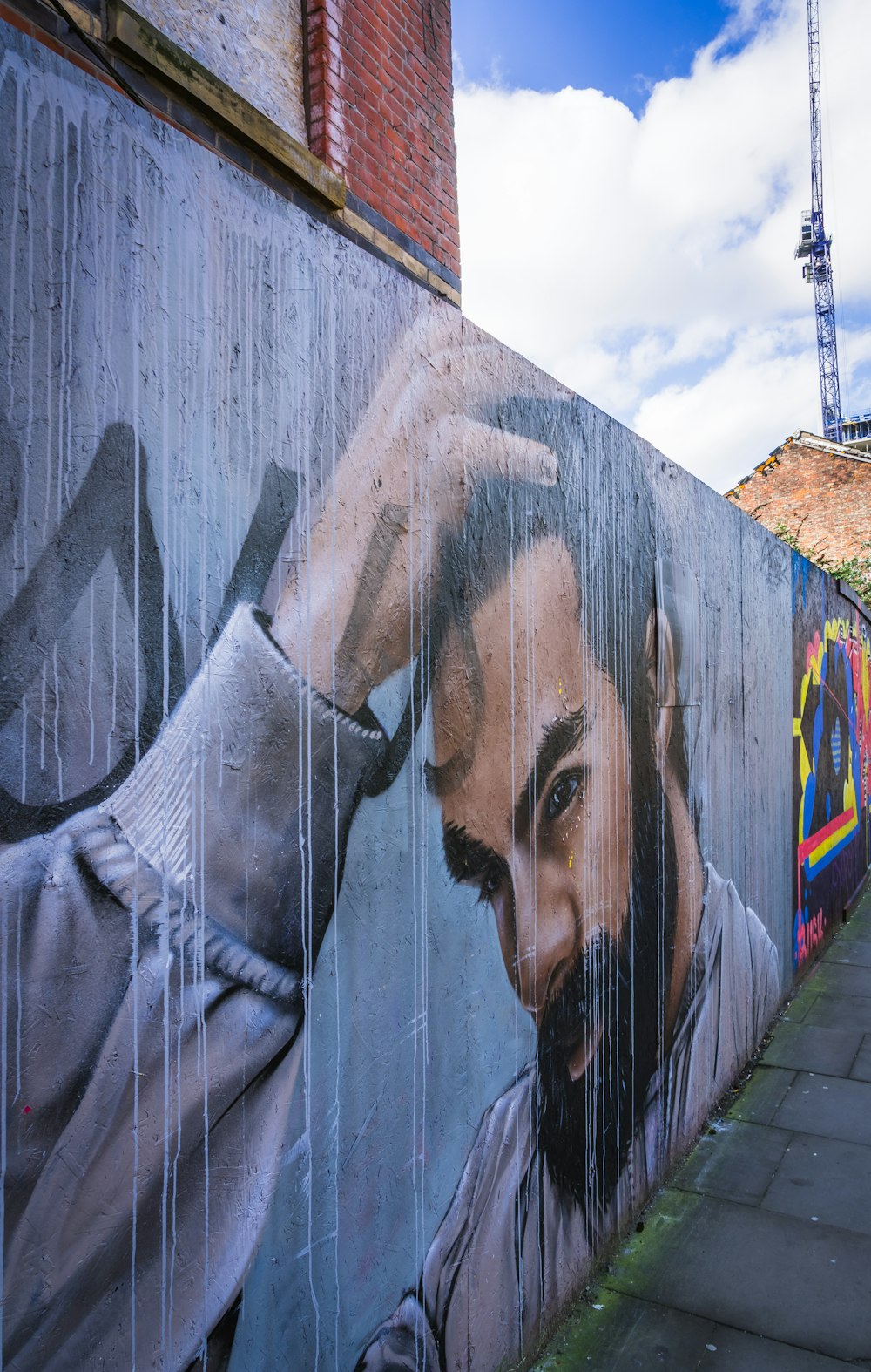 a mural of a man with a beard on a wall