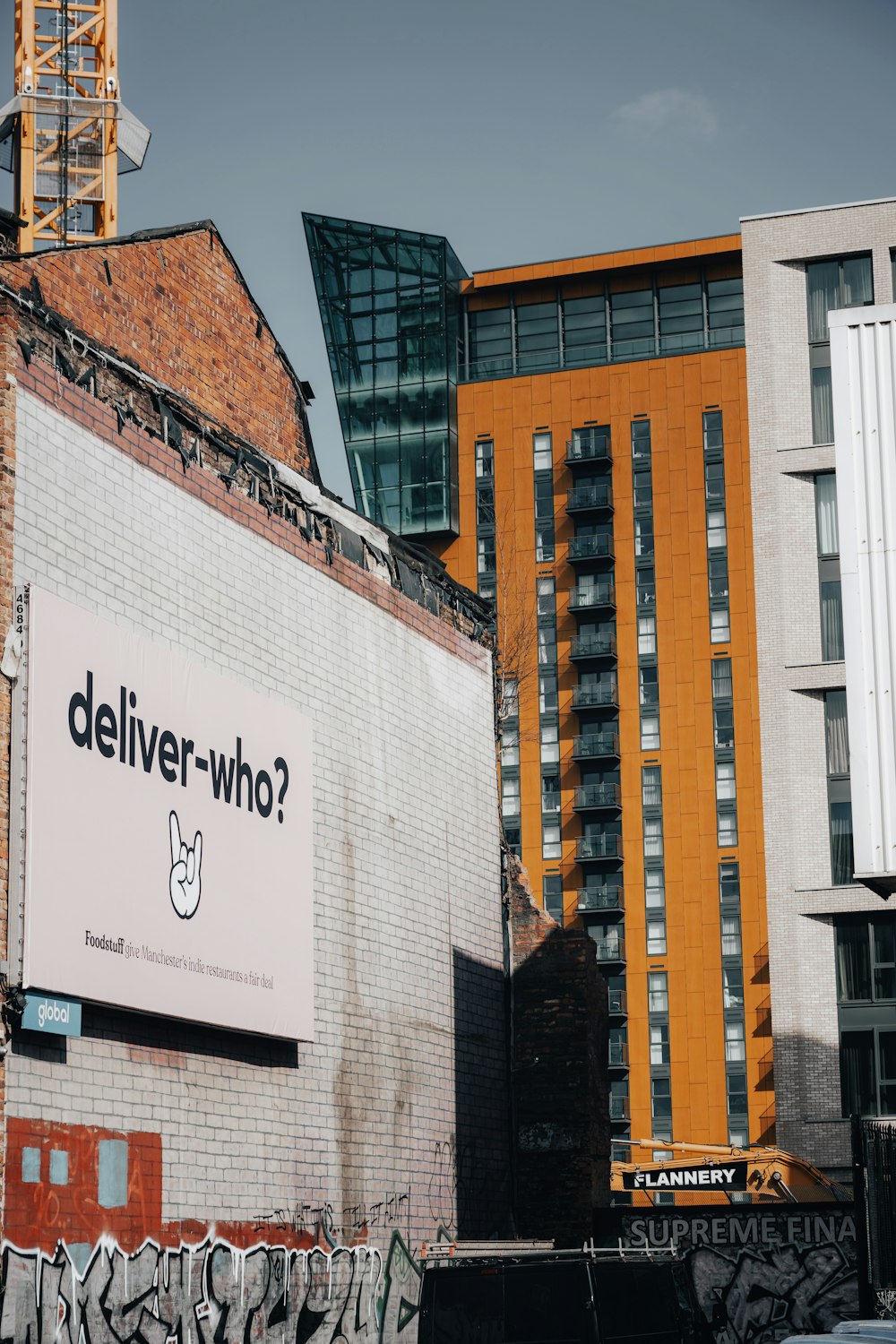a building with a sign that says deliver - who?
