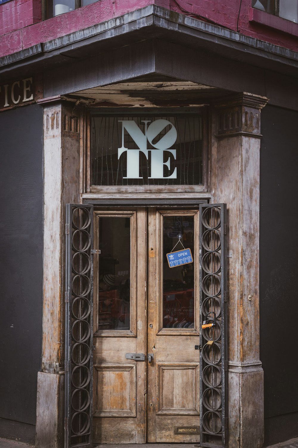 an old building with a sign on the front of it