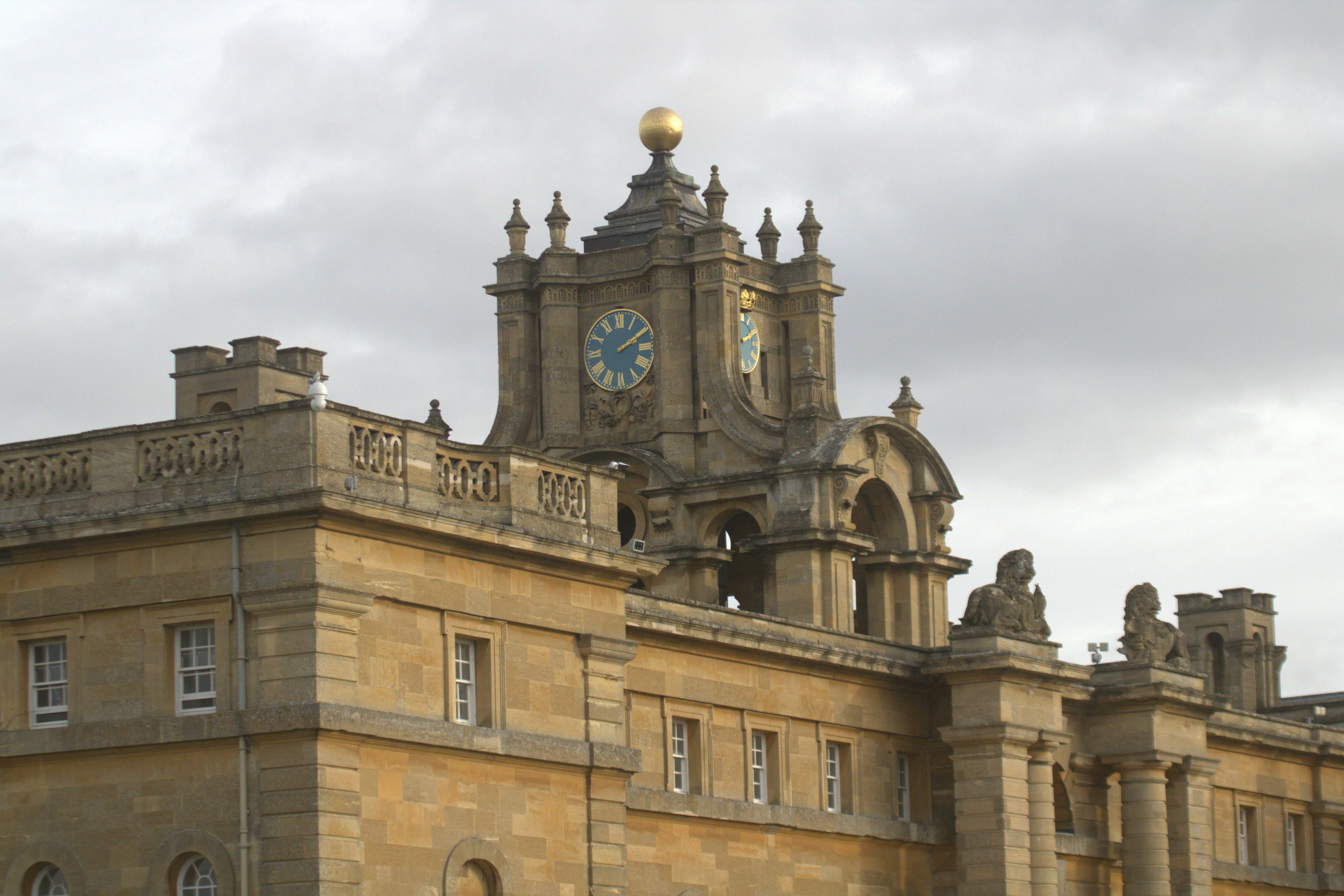 a large building with a clock on the top of it