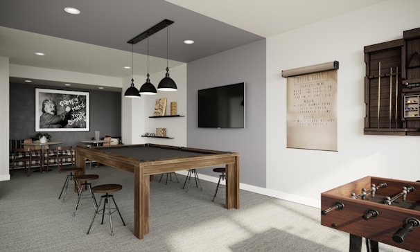 a game room with a pool table and foo foo