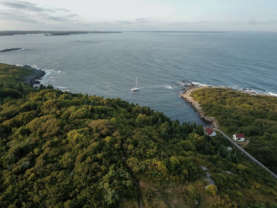 an aerial view of a small island in the middle of the ocean