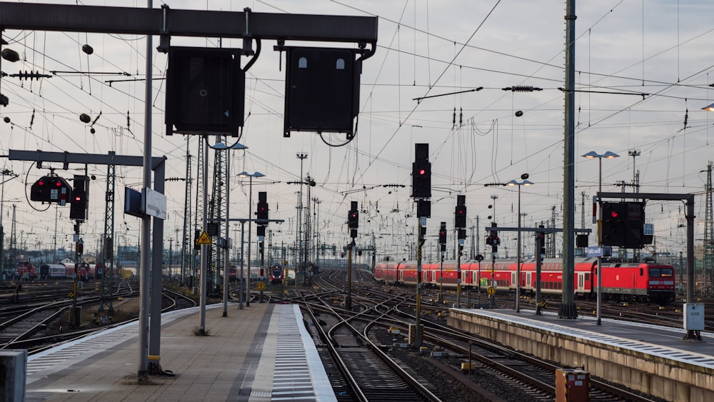 a train station with a train on the tracks