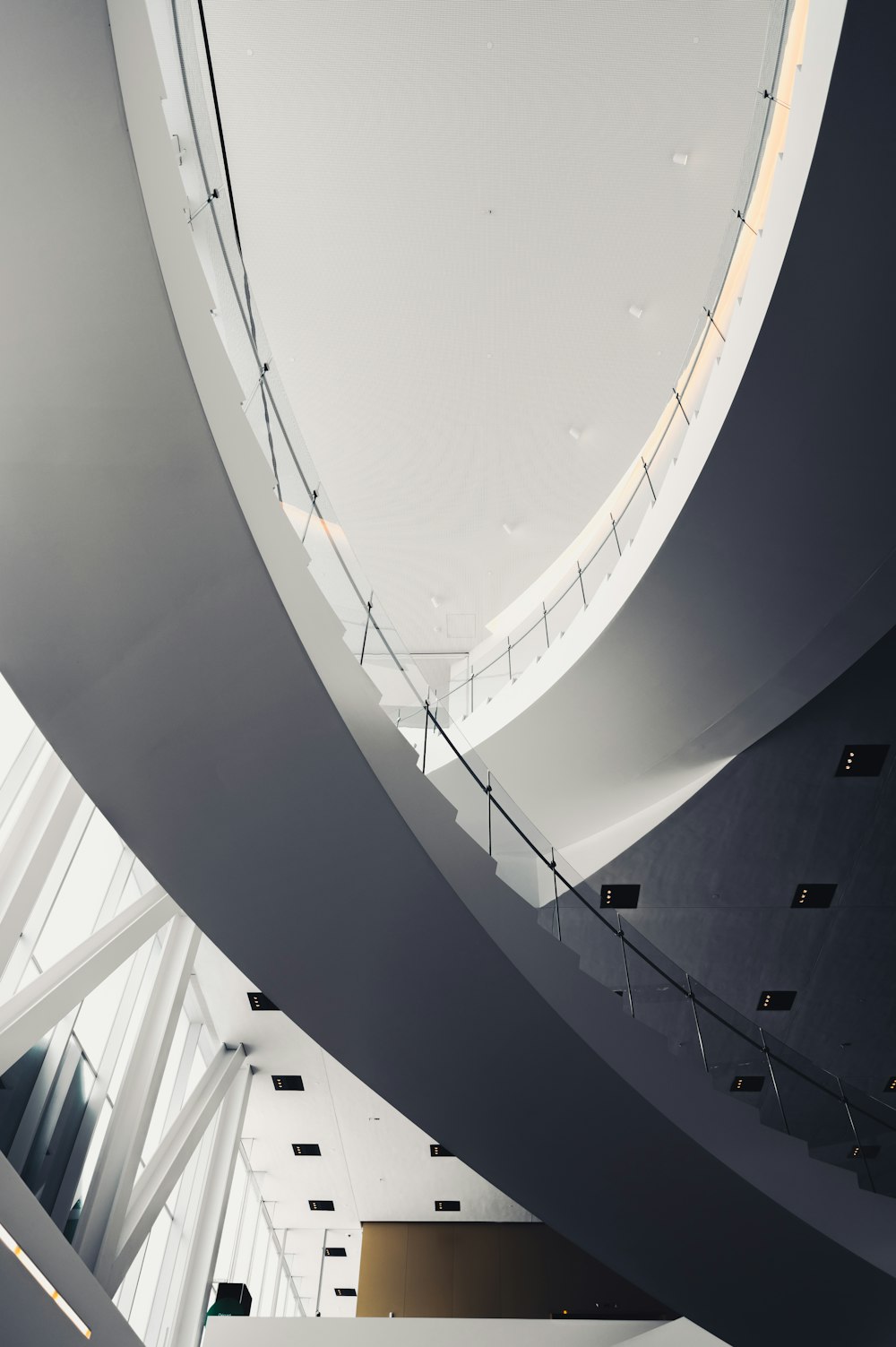 a large white building with a circular ceiling