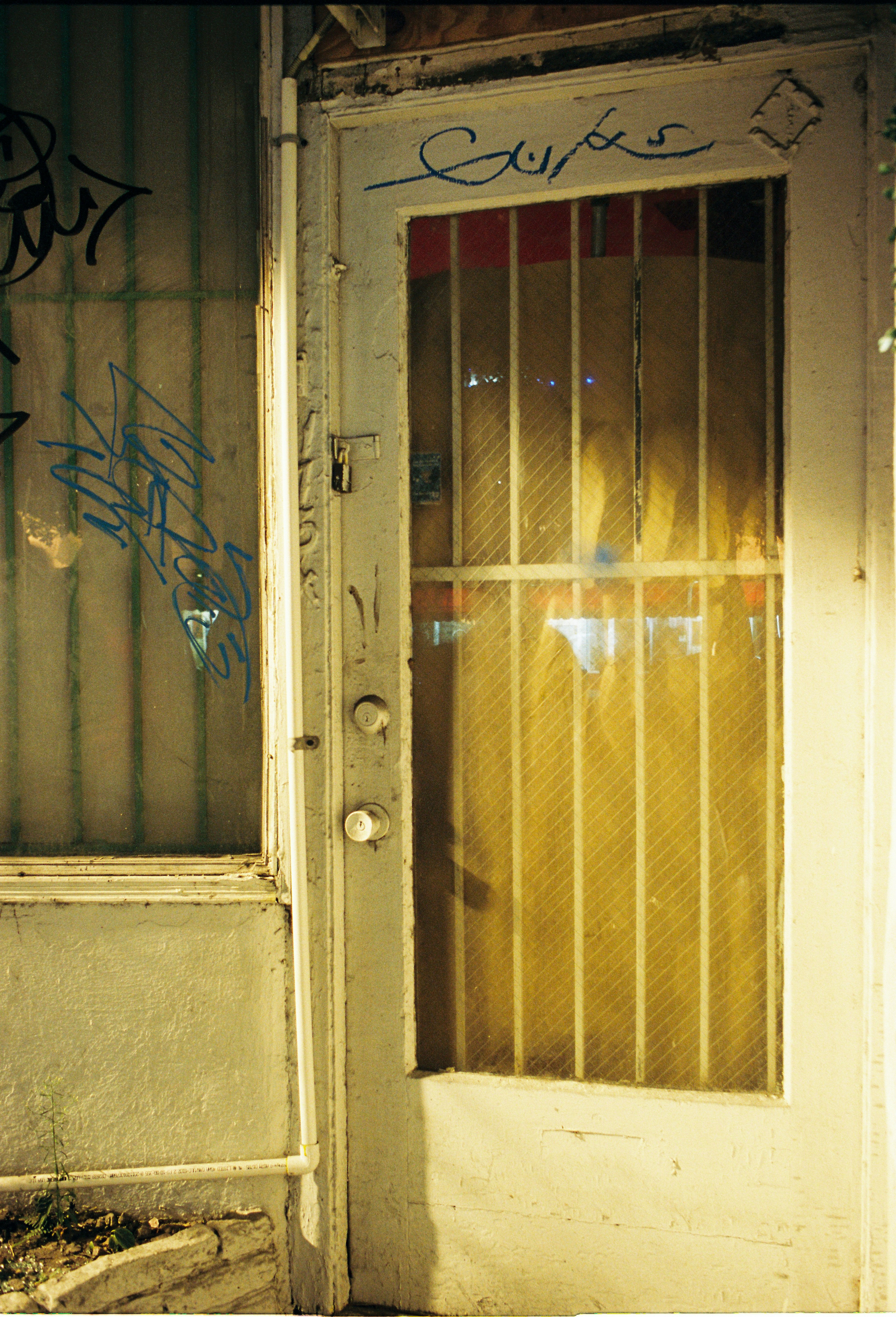 a door that has some graffiti on it