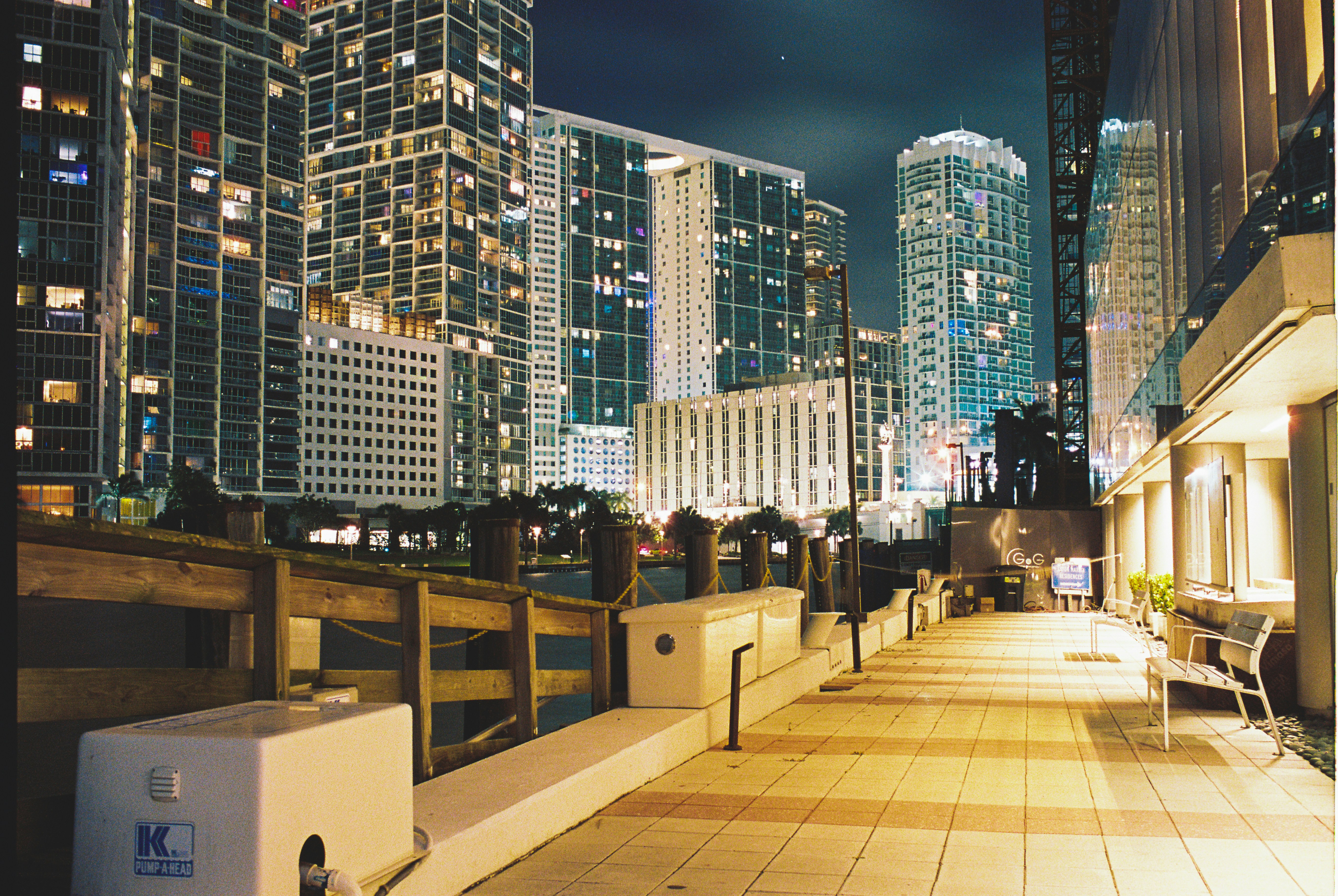 a view of a city at night from a rooftop