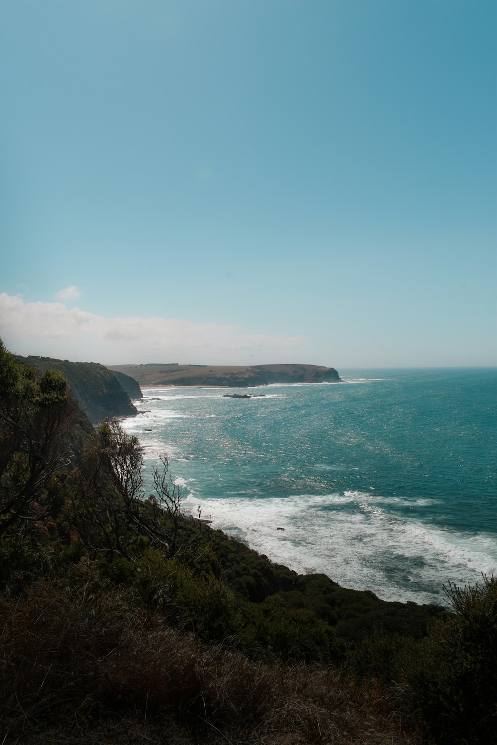 a view of the ocean from a cliff