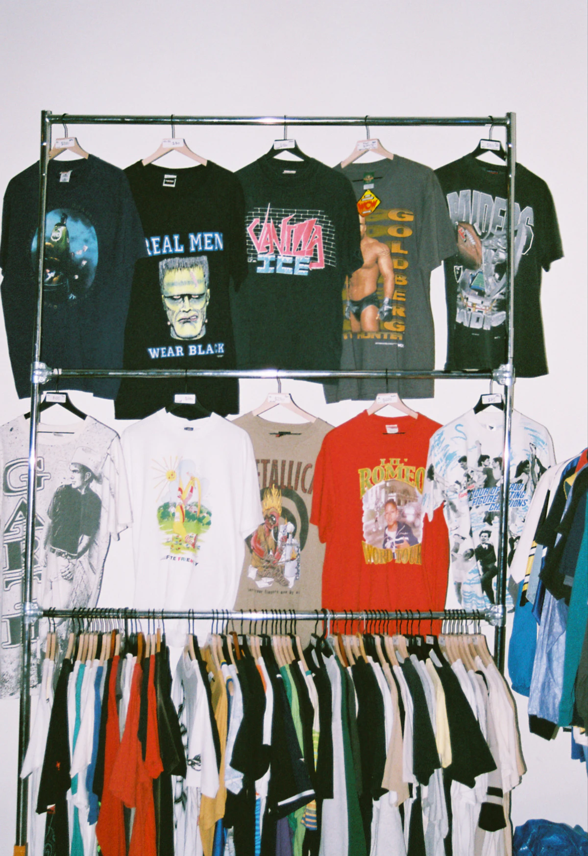 Rack of vintage shirts at a clothing vendor