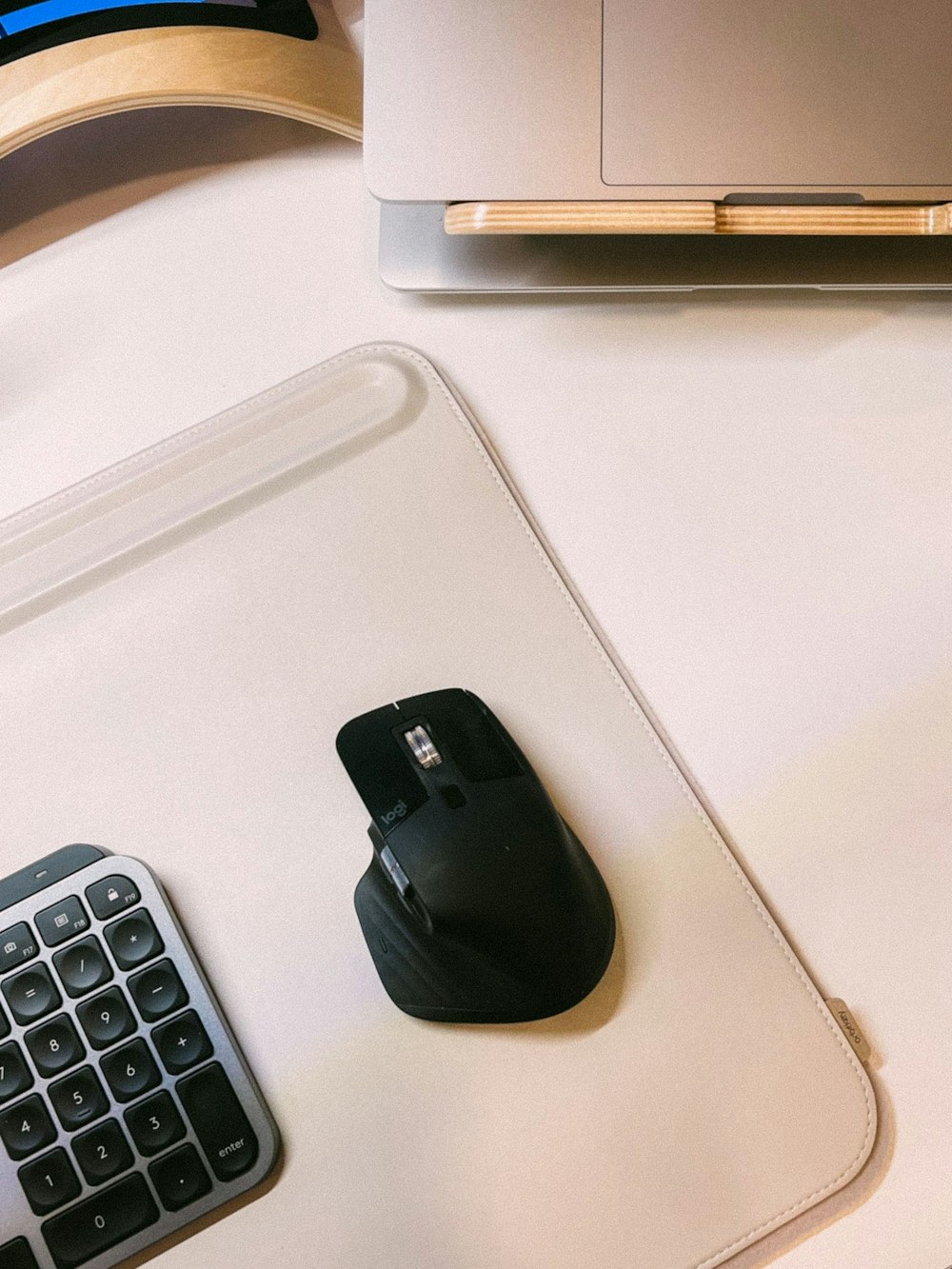 a computer mouse and a keyboard on a desk