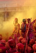 a group of people covered in colored powder