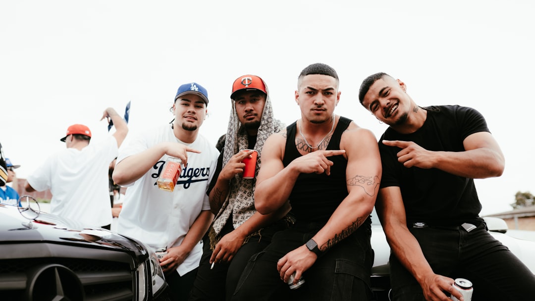 a group of young men standing next to each other, Go Ghettas - Post music video shoot