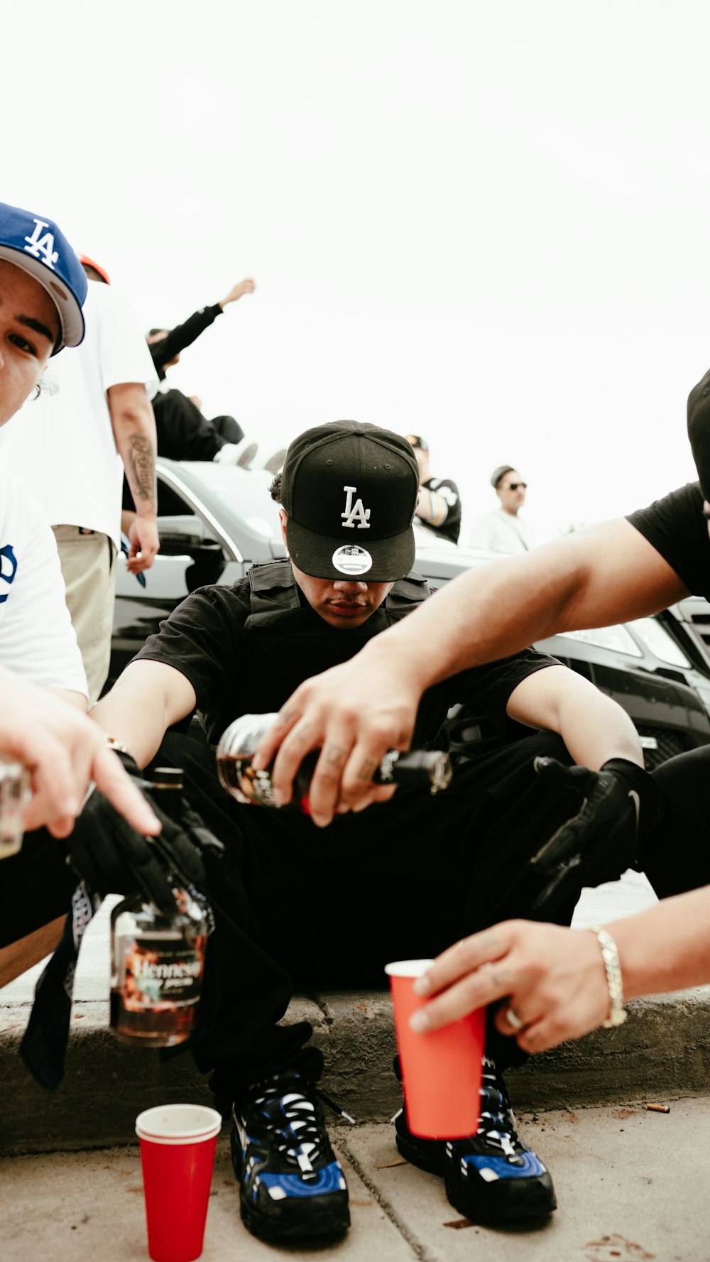 a group of young men sitting next to each other