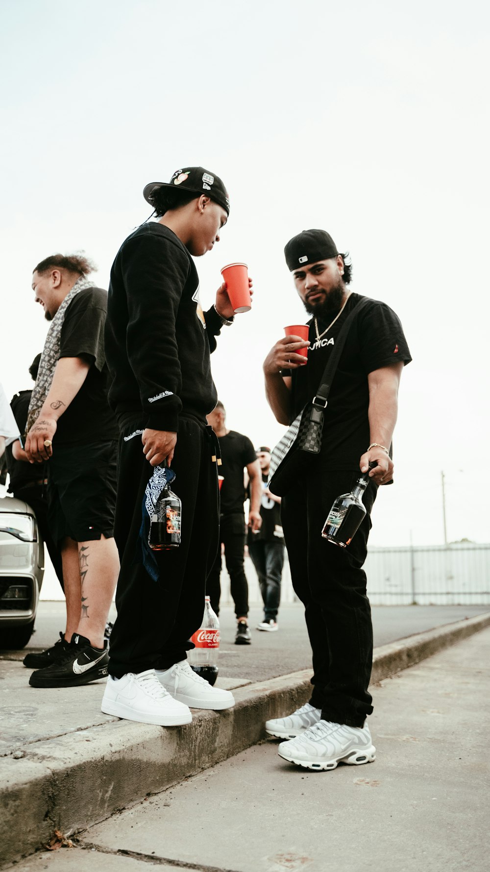 a group of young men standing next to each other