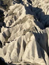 Aerial view of a geological site with diverse rock formations.