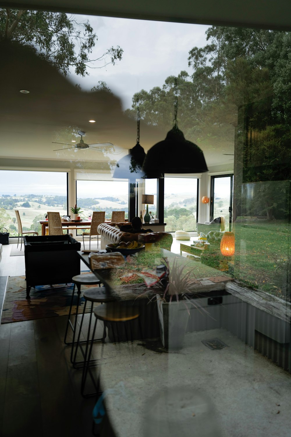 a dining room with a view of the outdoors