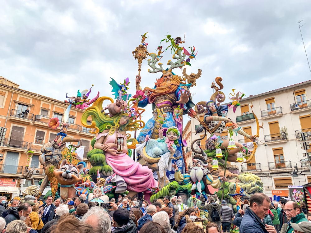 a group of people standing in front of a float