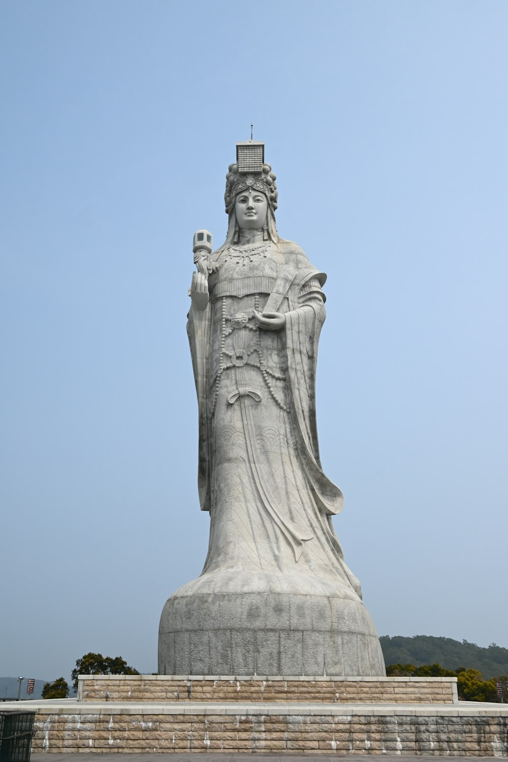 a large statue of a woman with a crown on her head