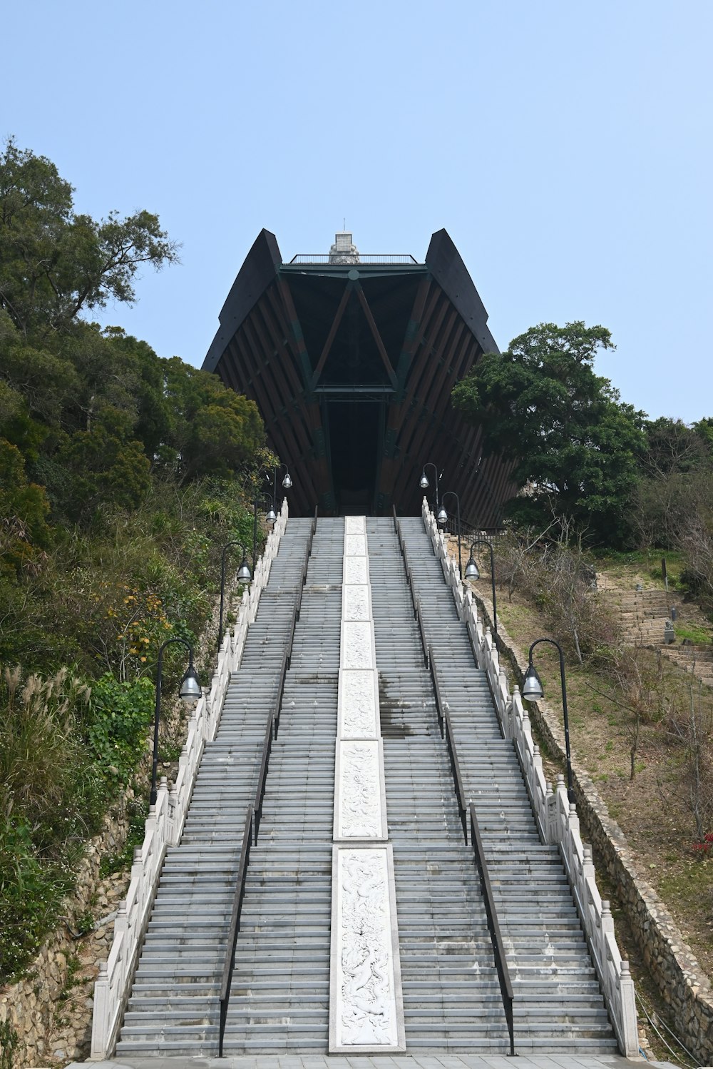 a set of stairs leading up to the top of a hill