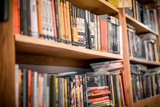 a book shelf filled with lots of books