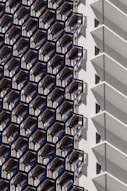 a close up of a tall building with balconies