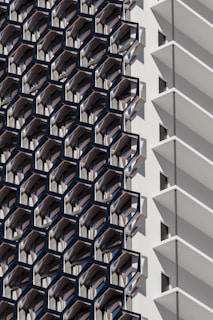 a close up of a tall building with balconies