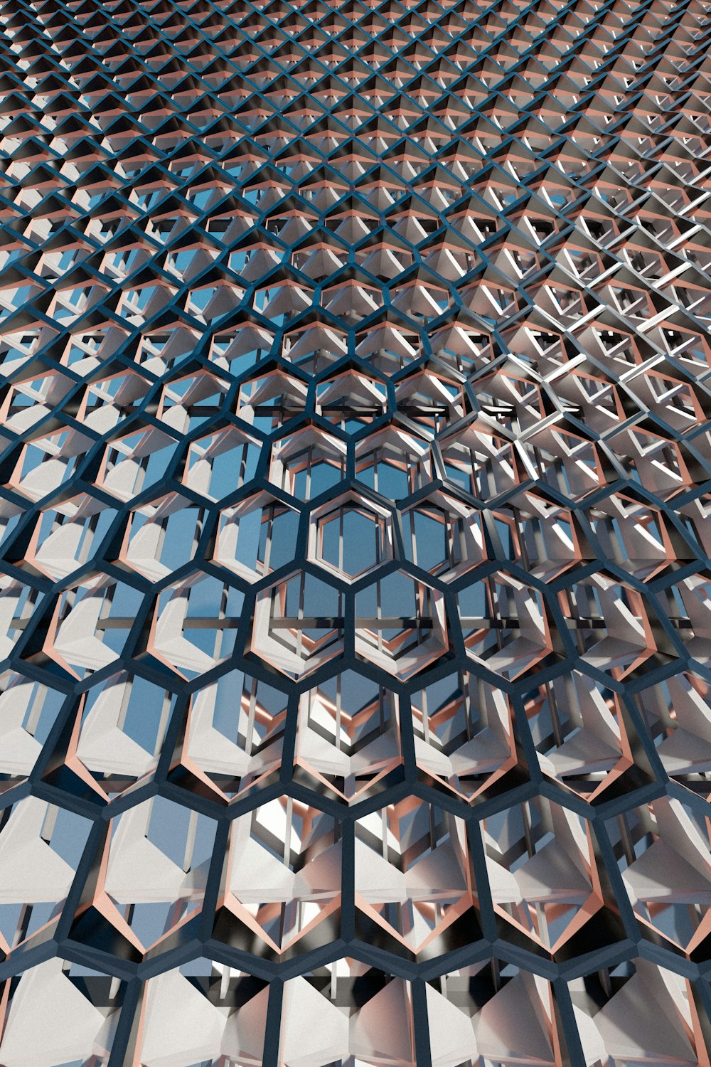 a close up of a metal structure with hexagonal shapes