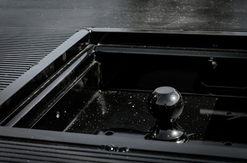 Close-up of a polished 3D interface element with subtle shadows.