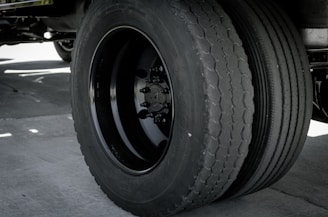 a close up of a large truck tire
