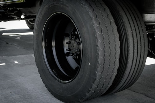 a close up of a large truck tire