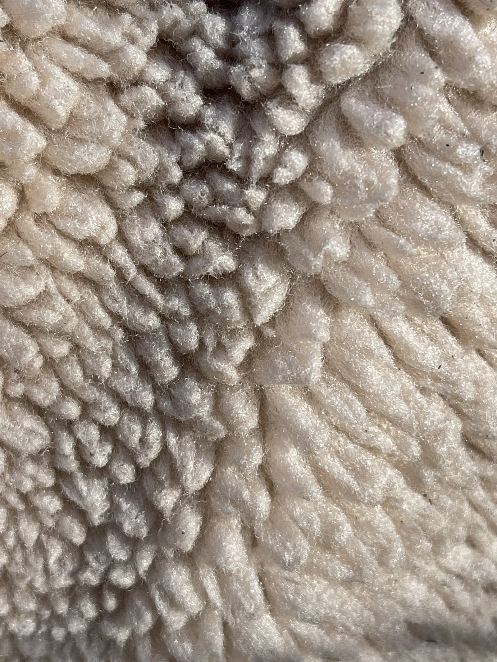 Raw fibre is the starting material, not the finished spec — how it's processed, treated and tested determines whether it performs as "natural insulation" or just as unprocessed wool.
