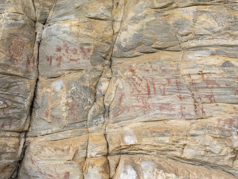a large rock with some writing on it