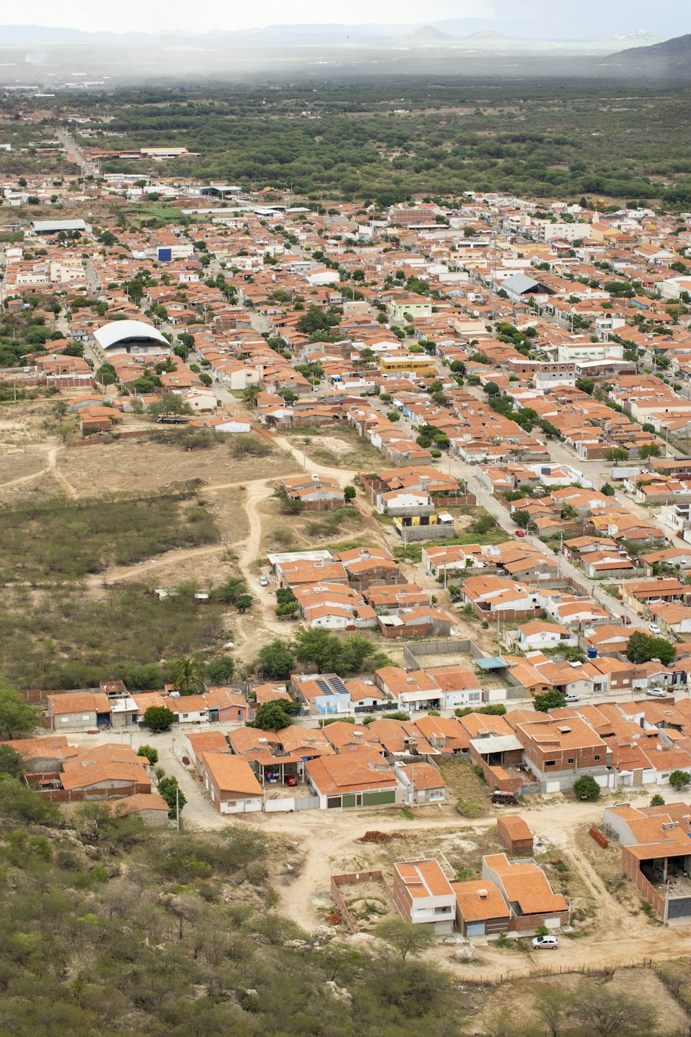 an aerial view of a small town in the desert